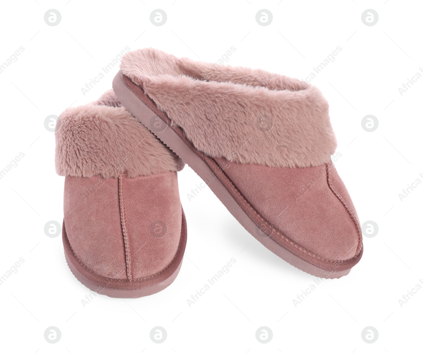 Photo of Pair of pink soft slippers isolated on white