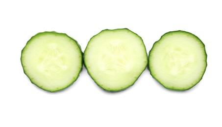 Photo of Slices of fresh ripe cucumber isolated on white