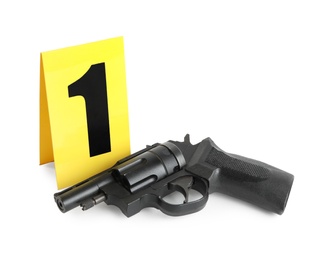Photo of Gun and crime scene marker with number one isolated on white
