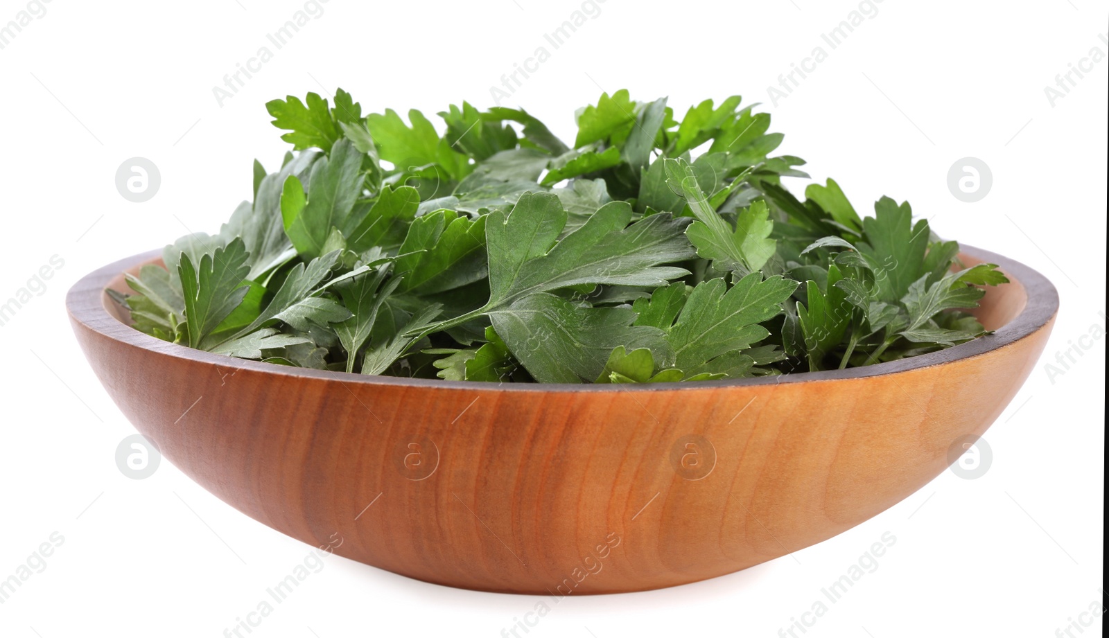 Photo of Fresh green parsley in wooden bowl isolated on white