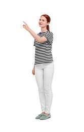 Photo of Happy woman pointing at something on white background