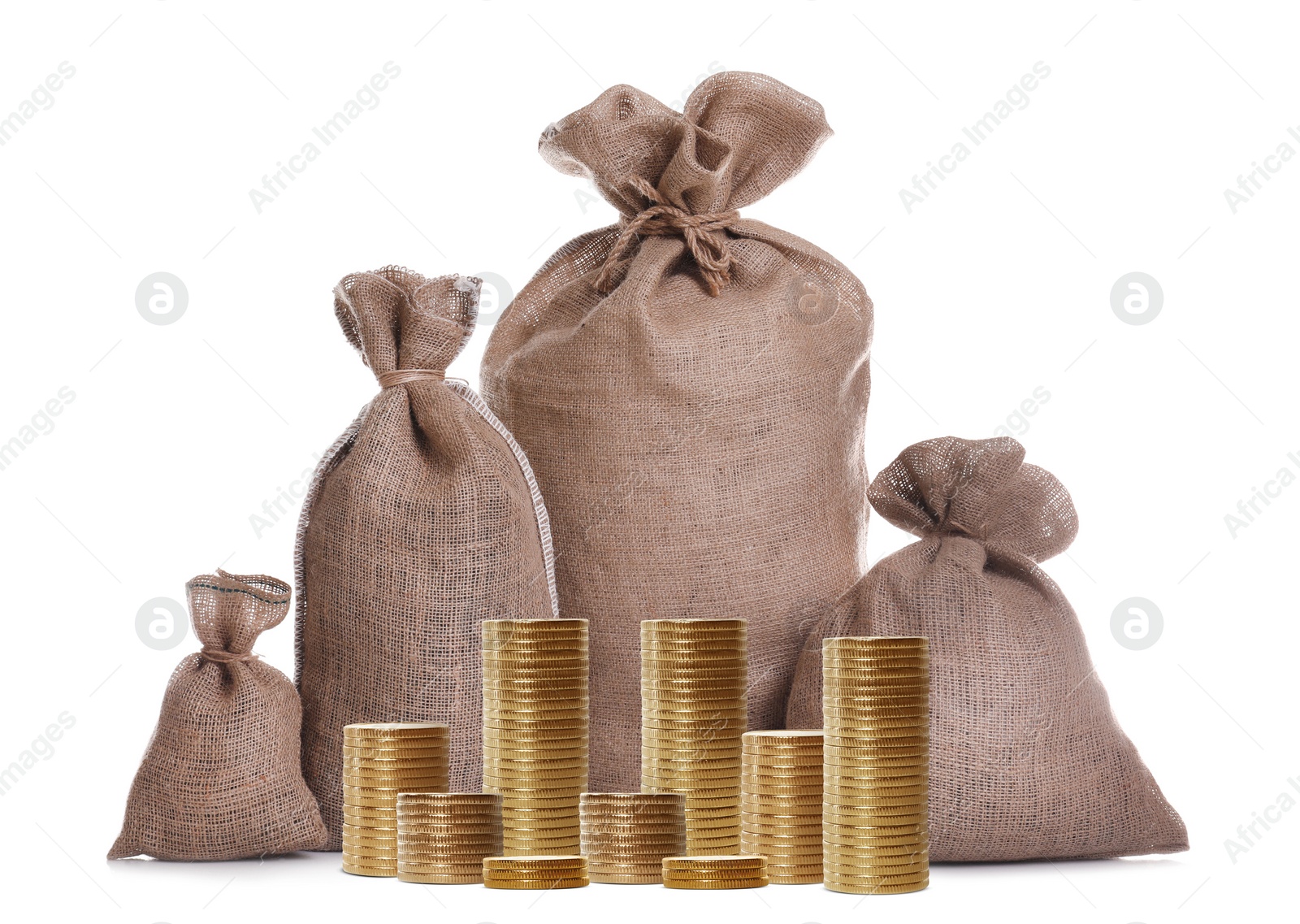 Image of Stacked coins and sack full of money on white background