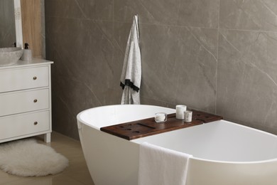 Modern white tub in bathroom. Interior design