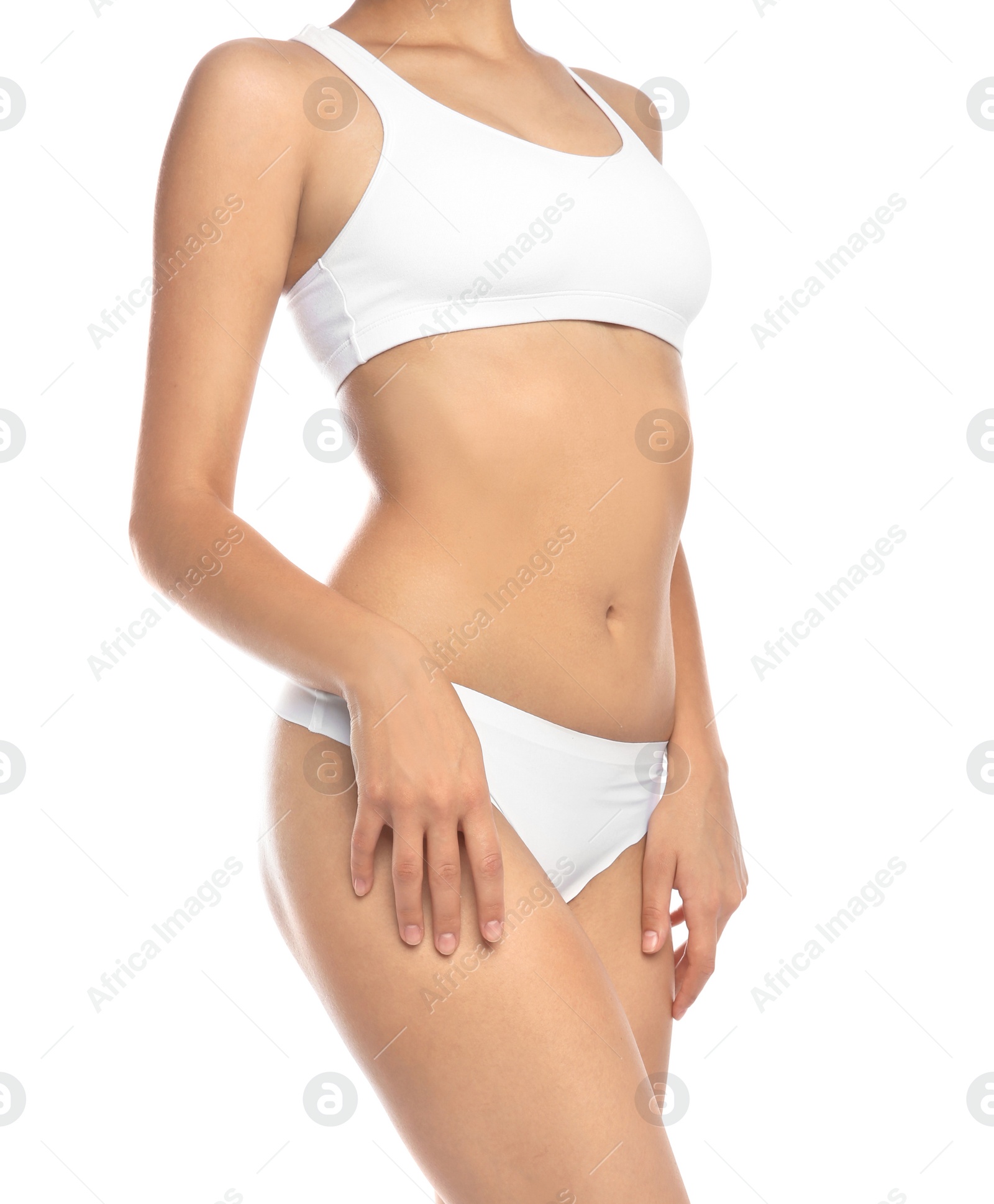 Photo of Young woman showing smooth skin after bikini epilation on white background