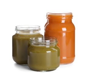 Photo of Jars with healthy baby food on white background