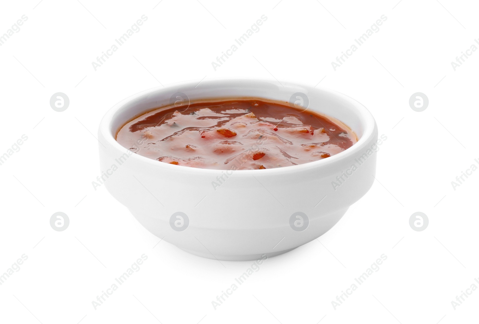 Photo of Tasty tomato sauce in bowl isolated on white