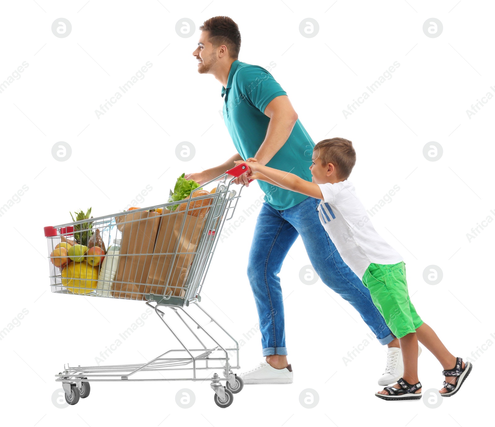 Photo of Father and son with full shopping cart on white background