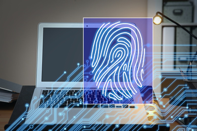 Image of Fingerprint identification. Modern laptop on table indoors