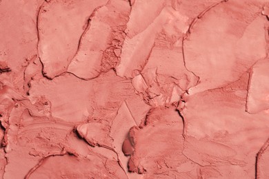 Texture of beautiful lipstick as background, top view