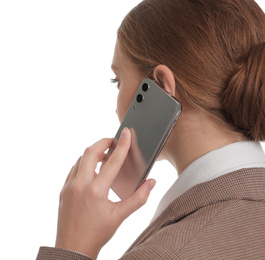 Photo of Young businesswoman talking on mobile phone against white background