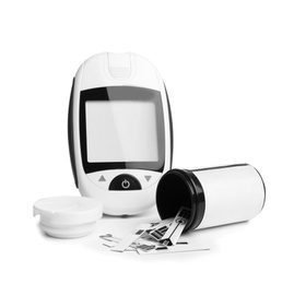 Photo of Digital glucometer and test strips on white background. Health care