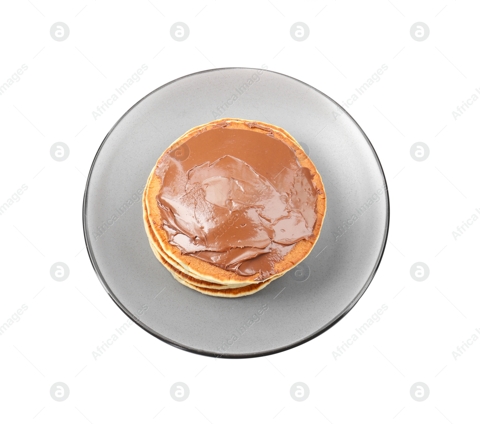 Photo of Delicious pancakes with chocolate paste isolated on white, top view