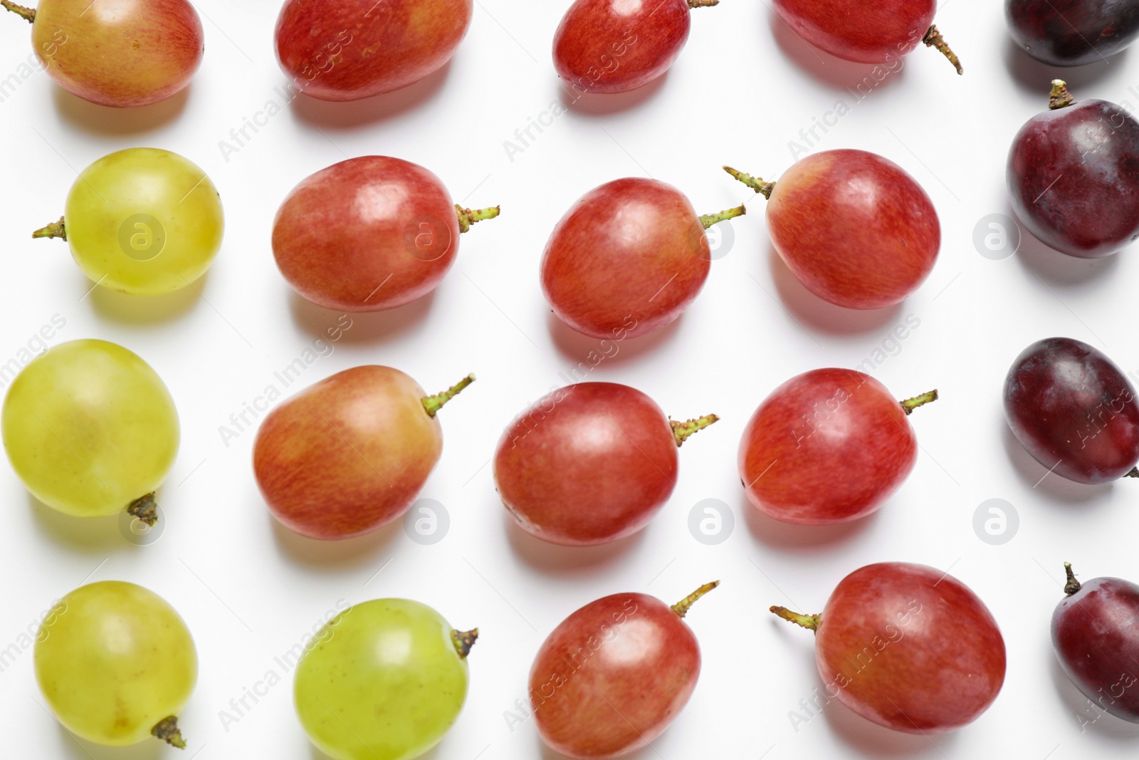 Photo of Fresh ripe juicy grapes on white background, top view