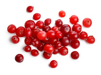 Photo of Pile of fresh ripe cranberries isolated on white, top view