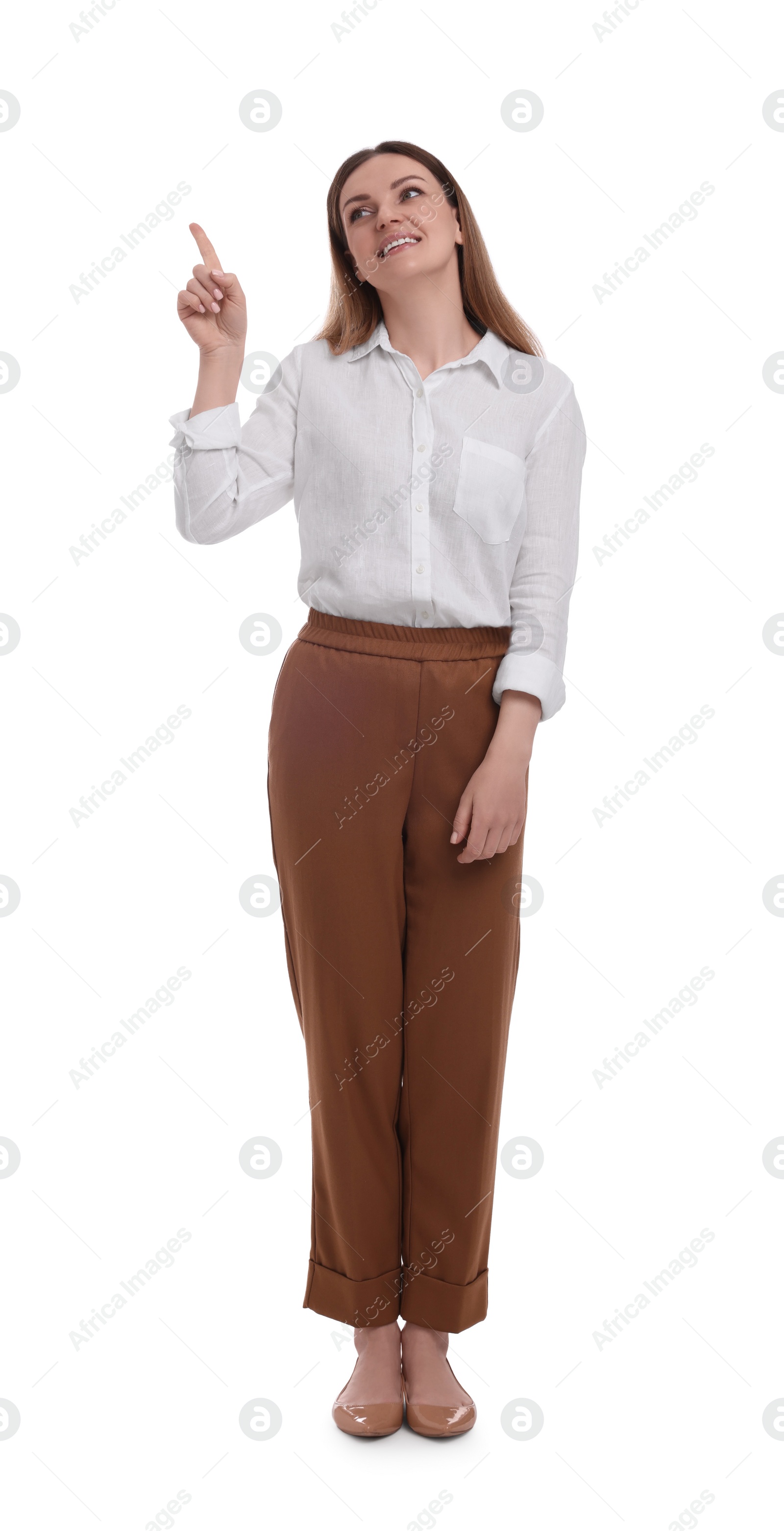 Photo of Full length portrait of beautiful businesswoman pointing at something on white background