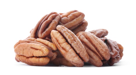 Photo of Heap of ripe shelled pecan nuts on white background