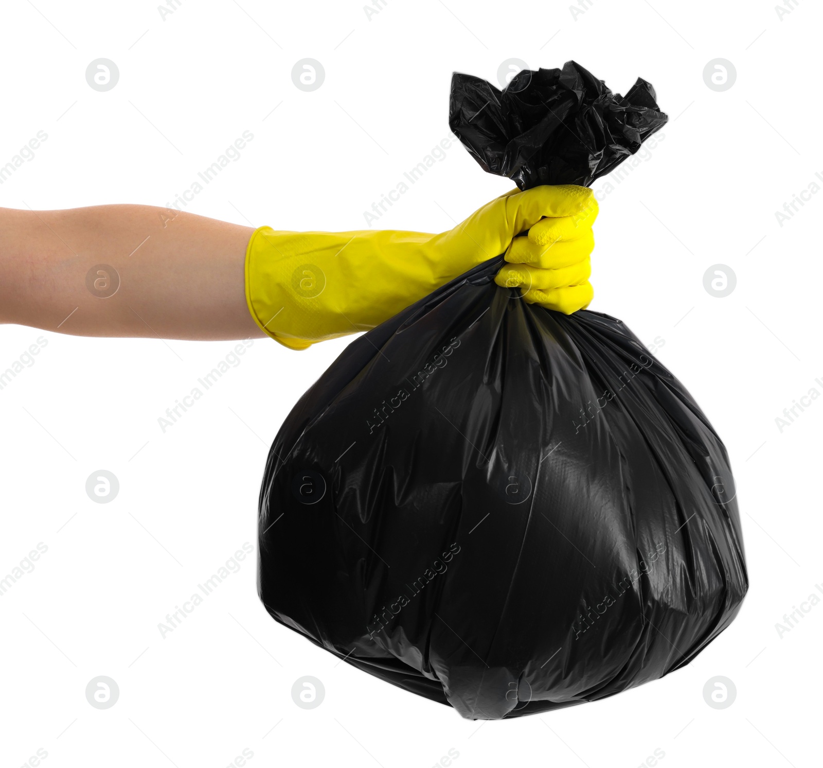 Photo of Woman holding plastic bag full of garbage on white background, closeup