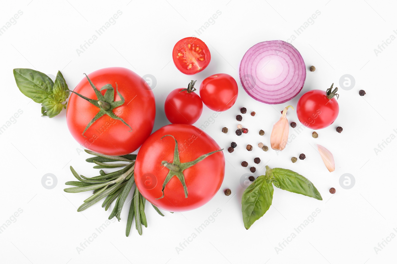 Photo of Flat lay composition with different whole and cut tomatoes on white background