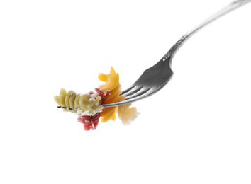 Photo of Fork with delicious spiraline pasta isolated on white