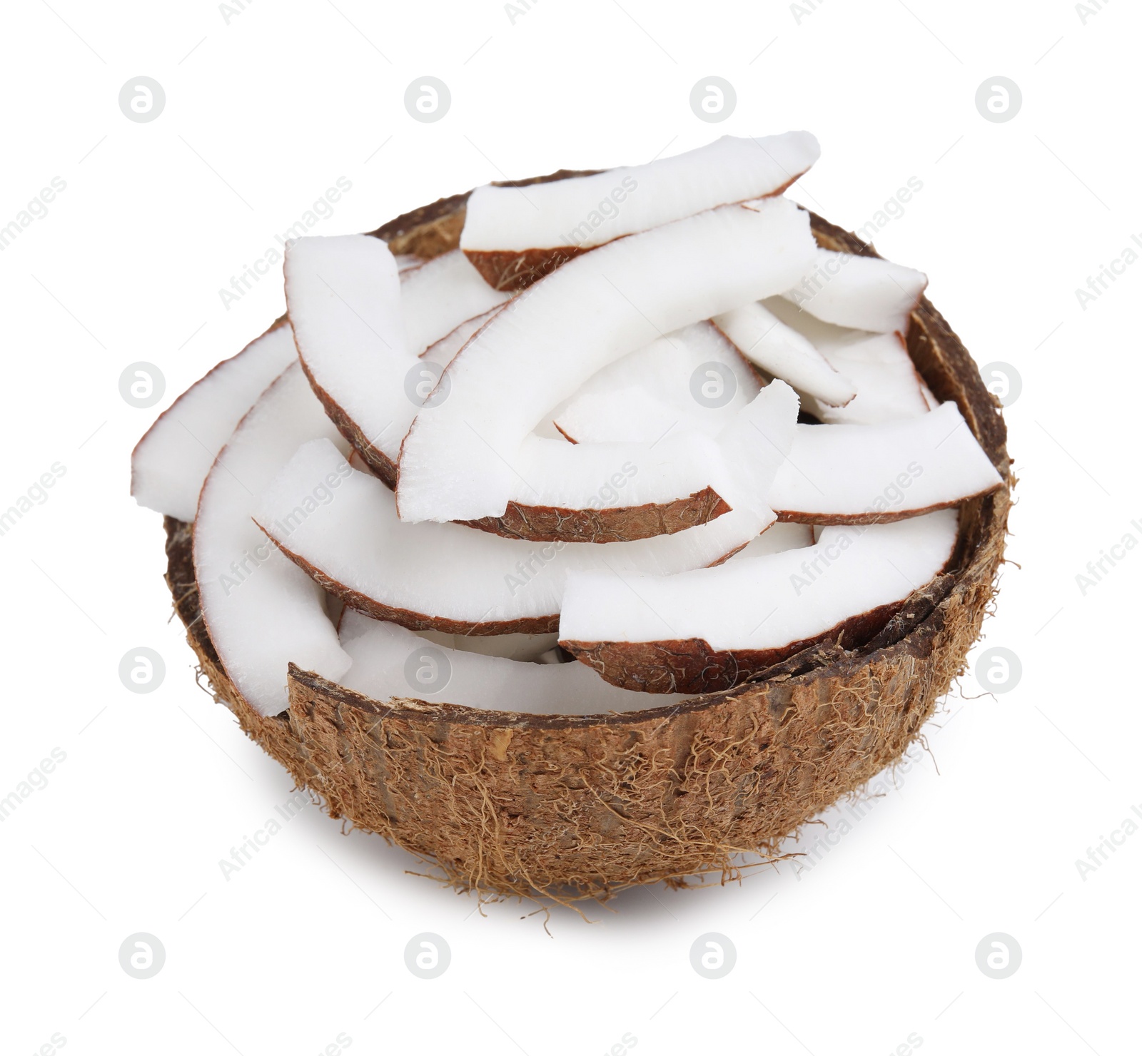 Photo of Fresh coconut pieces in nut shell isolated on white