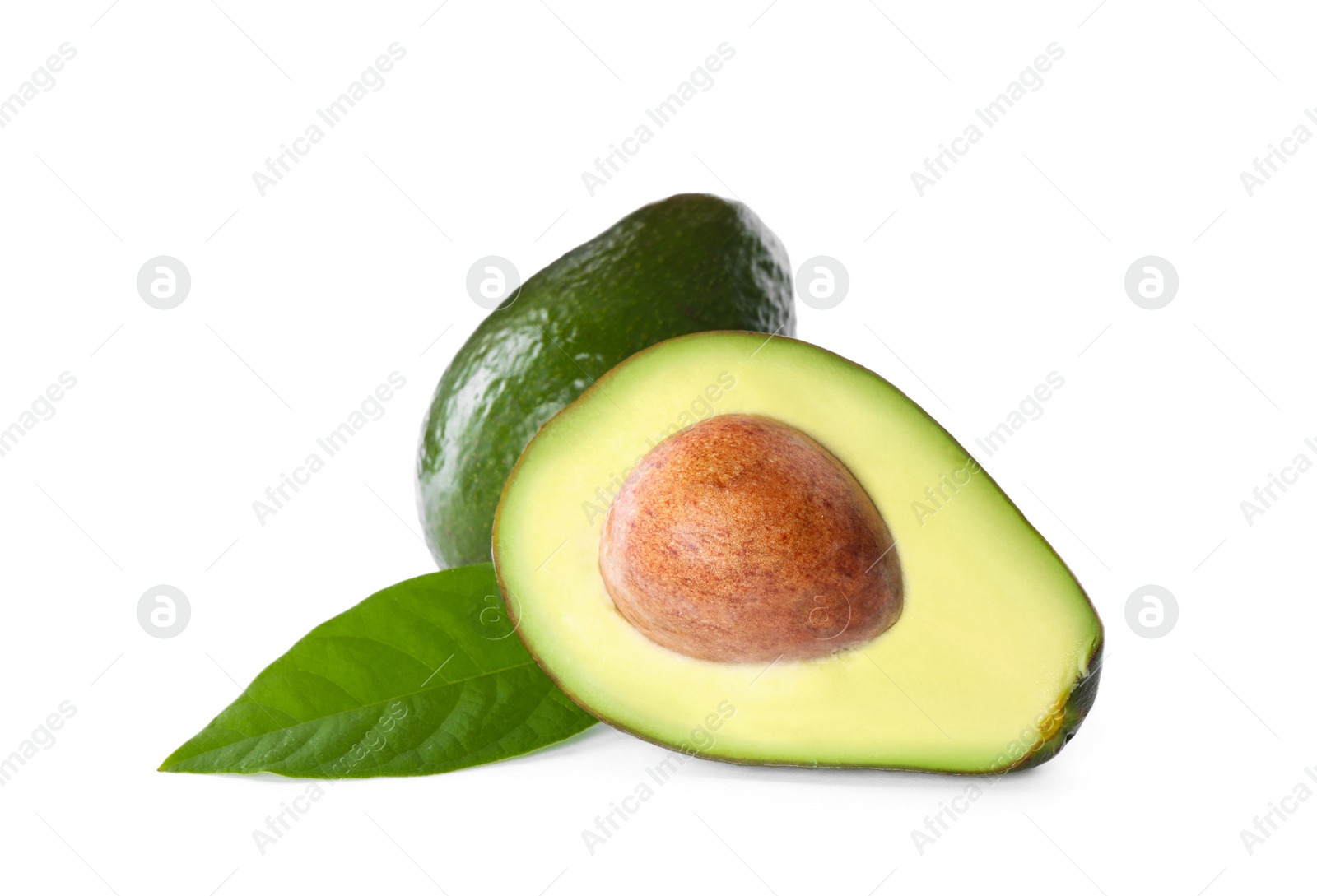 Photo of Whole and cut avocados isolated on white