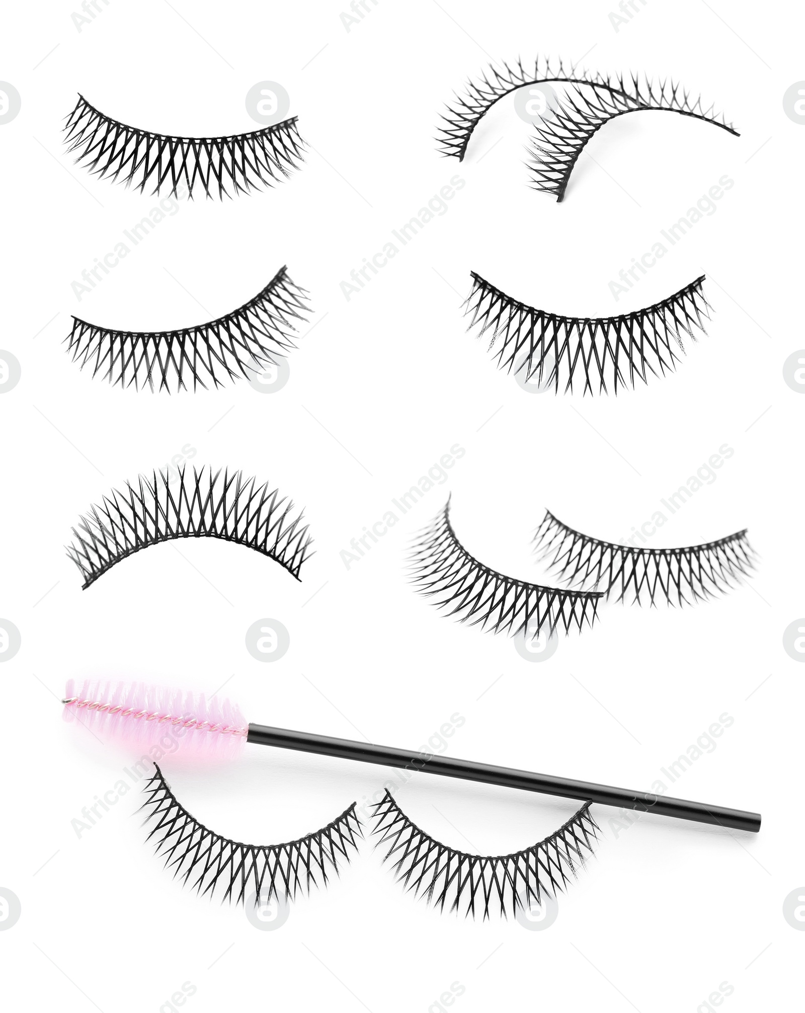 Image of Set with beautiful false eyelashes and brush on white background