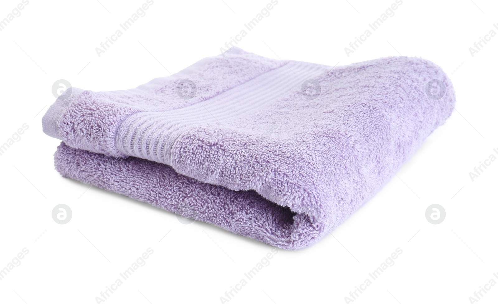 Photo of Folded violet terry towel isolated on white