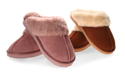 Photo of Different stylish soft slippers on white background