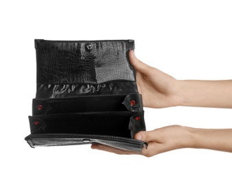 Photo of Poor woman showing her empty wallet on white background, closeup