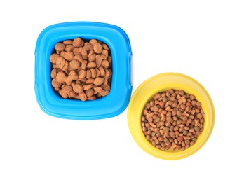 Dry pet food in feeding bowls isolated on white, top view