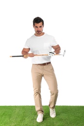 Photo of Young man posing with golf club on white background