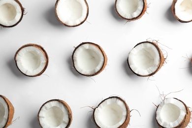 Photo of Coconut pattern on white background, top view