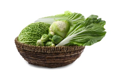 Photo of Wicker bowl with different types of fresh cabbage on white background