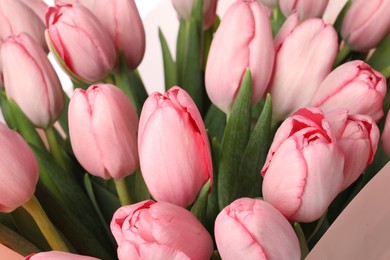 Photo of Bouquet of beautiful pink tulips on white background, closeup