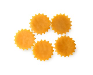 Photo of Natural beeswax cake blocks on white background, top view
