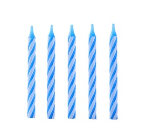 Photo of Blue striped birthday candles isolated on white