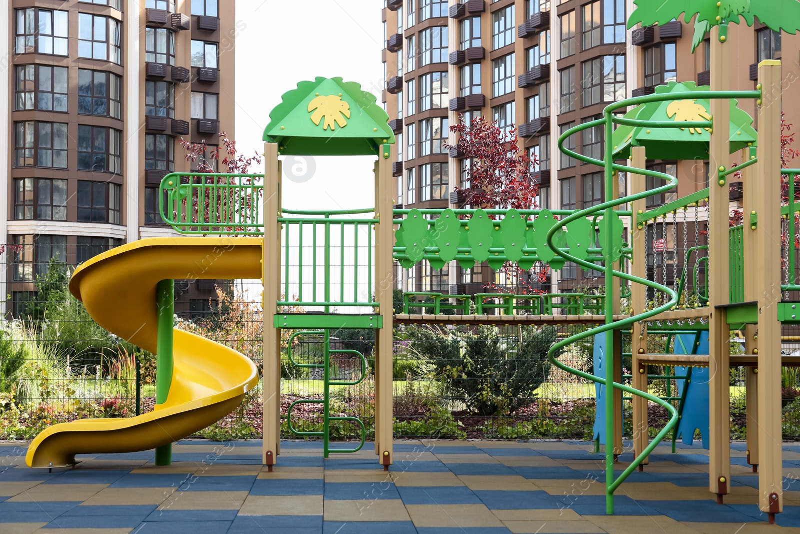 Photo of Colourful outdoor playground for children in residential area