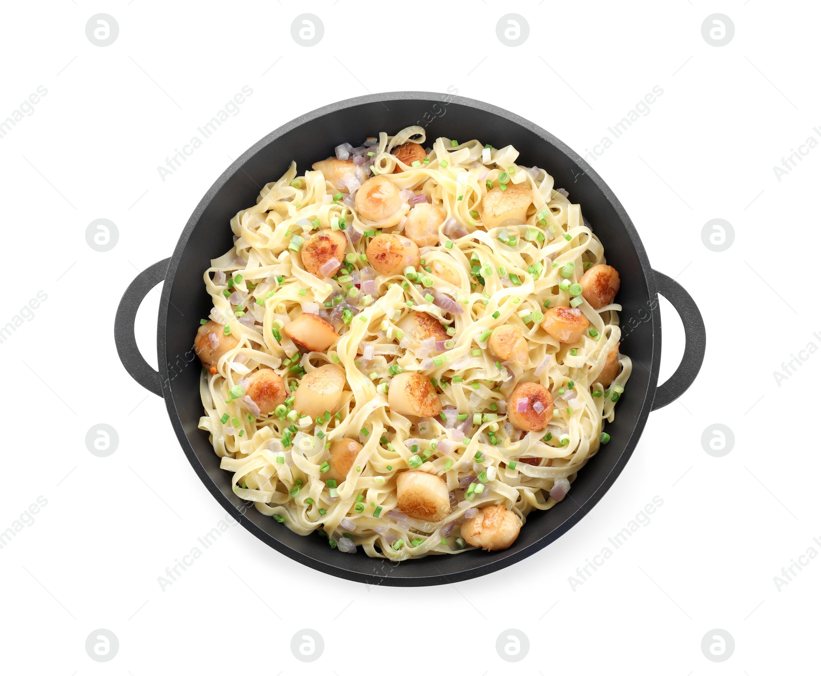 Photo of Delicious scallop pasta with onion in pan isolated on white, top view