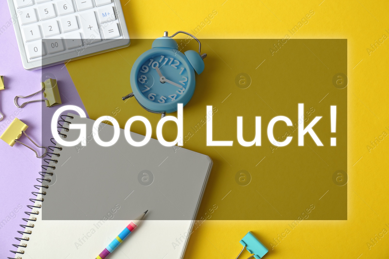 Image of Flat lay composition with stationery on yellow background. Good luck