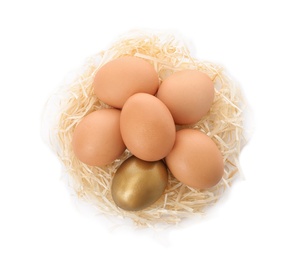 Golden egg among others in nest on white background, top view