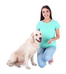 Young woman and her Golden Retriever dog on white background