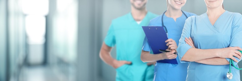 Doctors and nurse in hospital, closeup. Banner design with space for text
