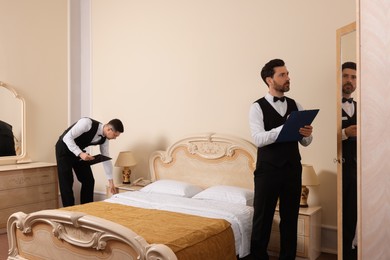 Men attending professional butler courses in hotel