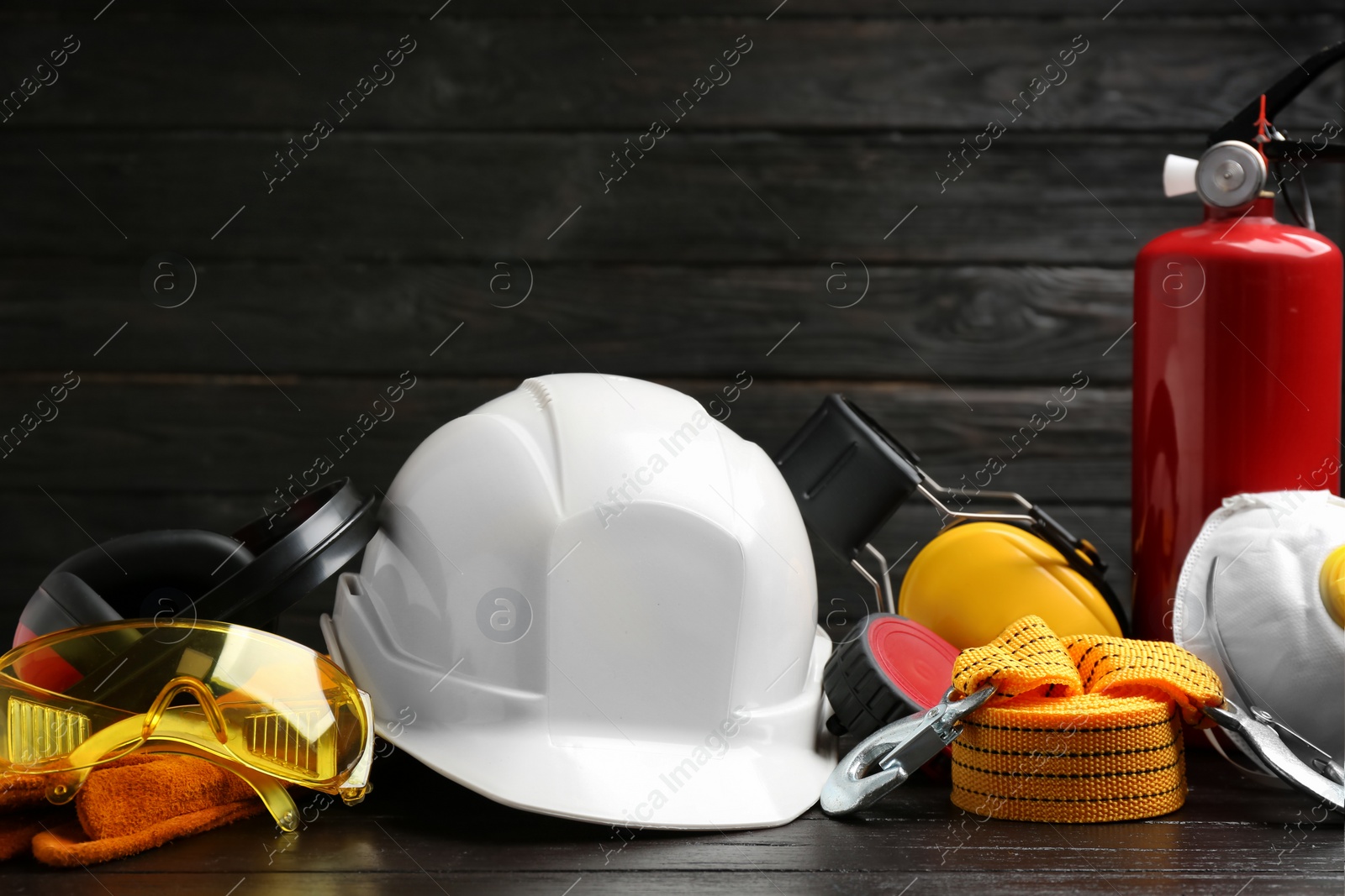Photo of Composition with different safety equipment on table