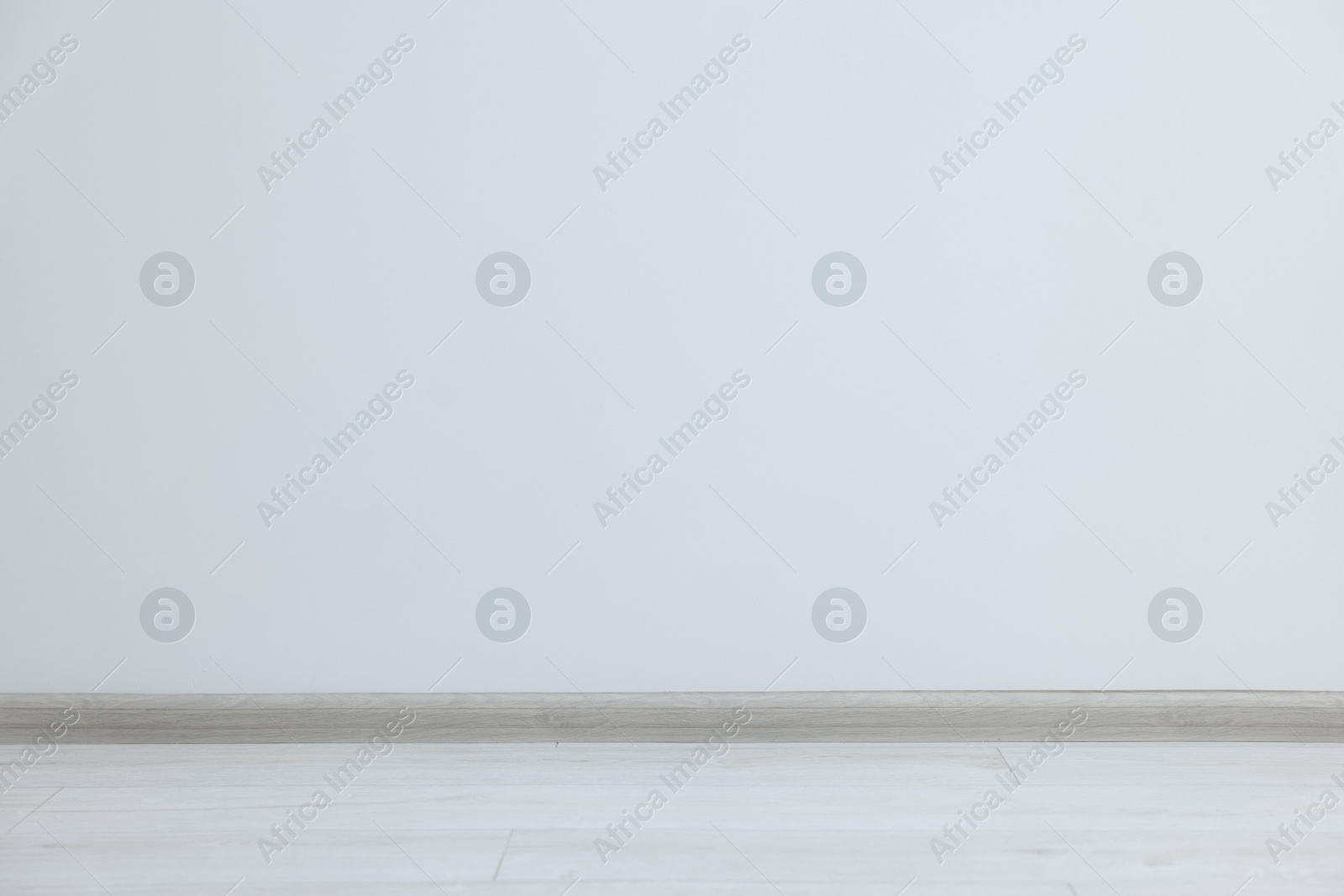 Photo of Beautiful white wall in clean empty room