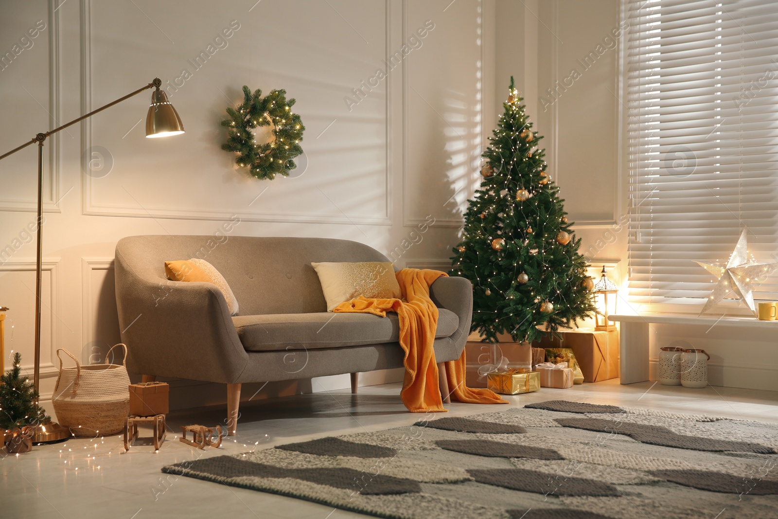 Photo of Stylish room with Christmas decorations. Festive interior design