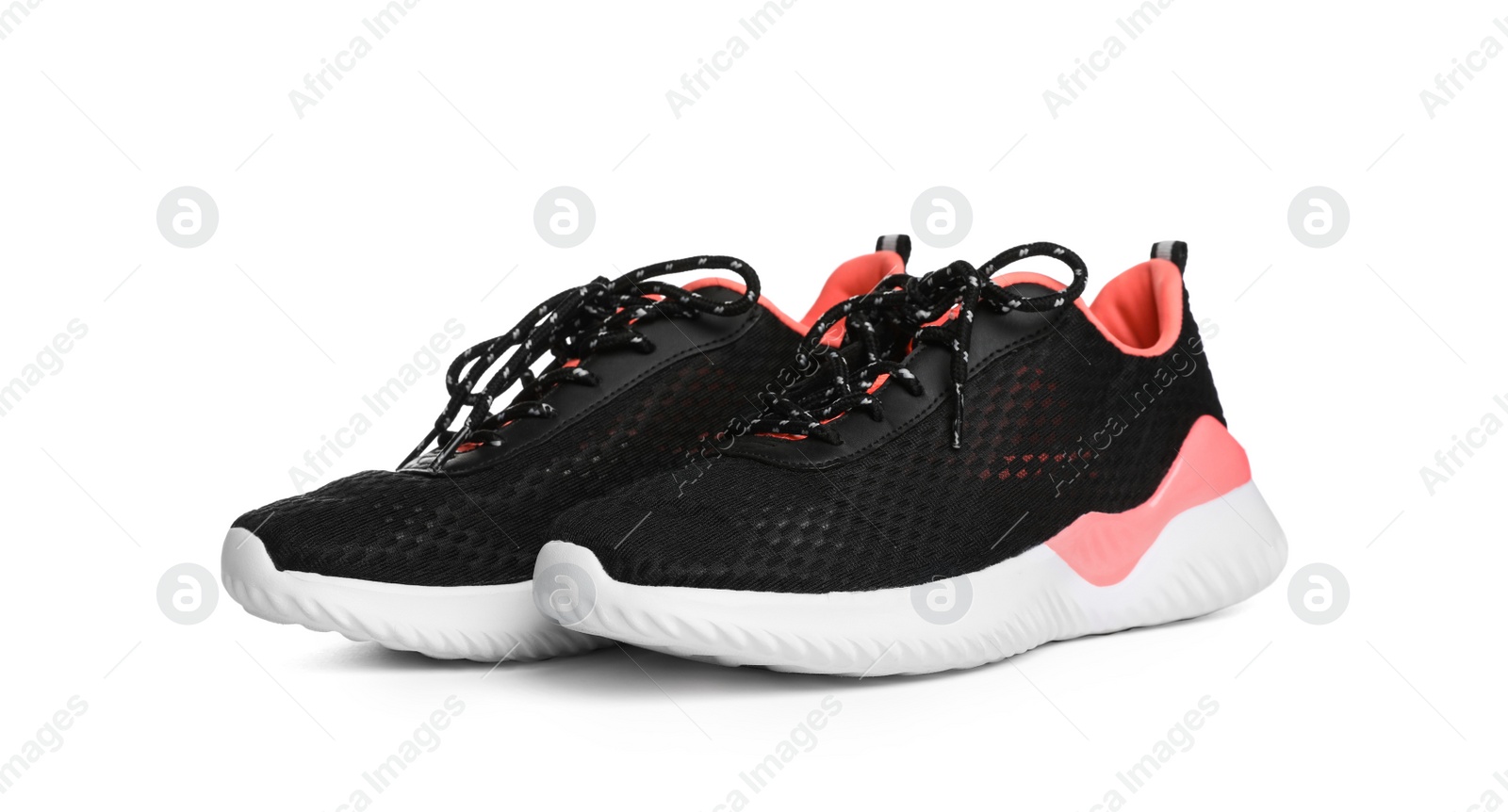 Photo of Pair of stylish sport shoes on white background