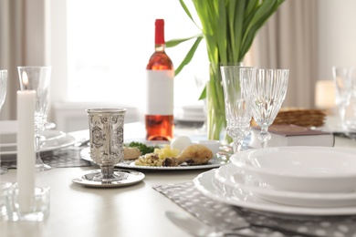 Photo of Table served for Passover (Pesach) Seder indoors