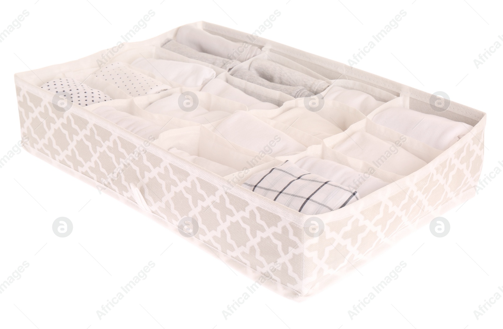 Photo of Textile organizer with folded clothes isolated on white