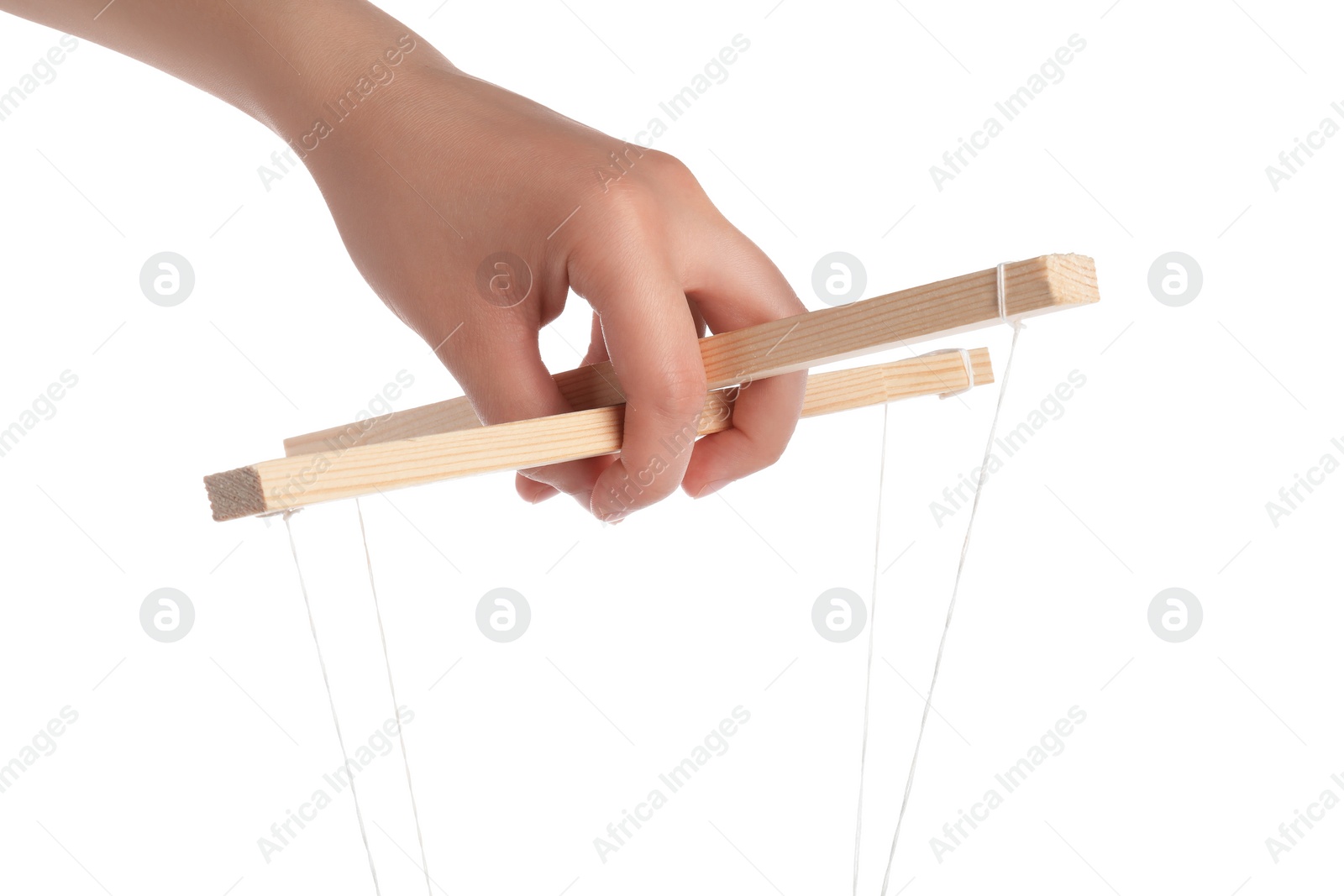 Photo of Woman pulling strings of puppet on white background, closeup